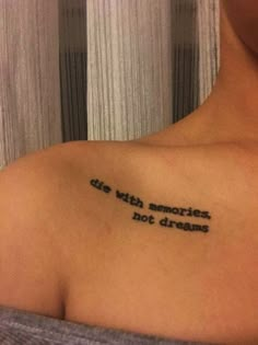 a woman with a tattoo on her shoulder that says, die with memories not dreams