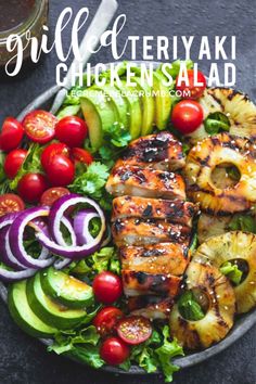 grilled teriyaki chicken salad with avocado, tomatoes, onions and cucumbers