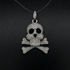 Vintage Pave Diamond Skull and Cross Bones Gold Pendant Necklace Simply Fabulous! Highly detailed Custom Pendant featuring Pave Diamond Skull and Cross Bones (1.65tcw). Hand crafted in 18K White Gold. More Beautiful in Real time! Sure to be admired…A piece you’ll turn to time and again! Skull And Cross Bones, Diamond Skull, Edgy Elegance, Custom Pendant, Cross Bones, Gold Skull, Bone Pendant, Custom Pendants, Modern Necklaces