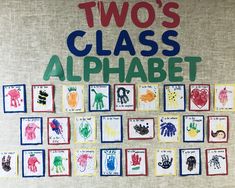 two's class alphabet with handprints on the front and back wall in different colors