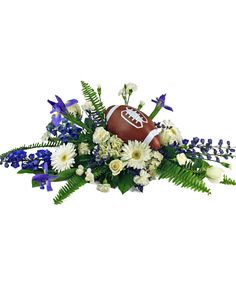 a football arrangement with blue flowers and greenery