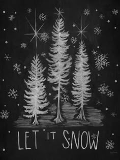 the words let it snow written on a chalkboard with trees and snowflakes