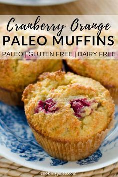 cranberry orange paleo muffins on a blue and white plate