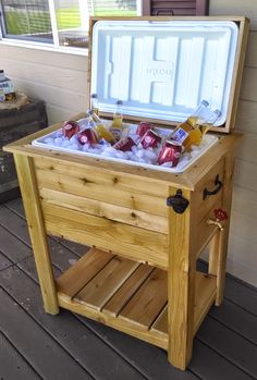 an ice chest with drinks in it on the porch