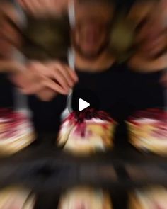 blurry image of food being served to people