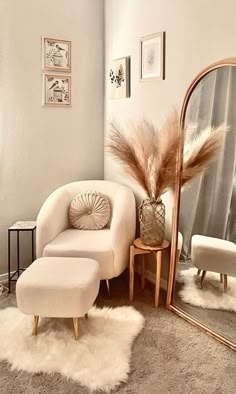 a living room with a chair, mirror and stool in the corner on carpeted flooring