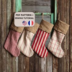 three christmas stockings hanging from the side of a wooden door with an american flag pattern on them