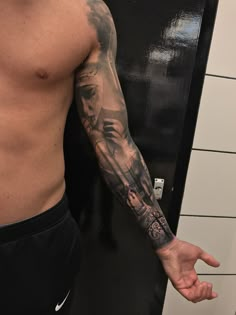 a man's arm with a tattoo on it