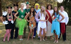 a group of people dressed up in costumes