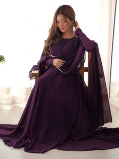 Introducing our stunning "fascinating purple georgette festival wear gown with dupatta" - the perfect outfit for all your festive occasions. This beautiful purple gown is made of high-quality georgette fabric with intricate lace work, giving it an elegant and sophisticated look. The gown is fully stitched and comes in sizes ranging from XS to XXL, ensuring a perfect fit for everyone.
This ensemble include a purple color georgette gown with lace work, a similar color cotton pant, and a georgette Elegant Georgette Gown With Dabka, Elegant Purple Chiffon Gown, Formal Purple Chiffon Maxi Dress, Elegant Purple Dabka Salwar Kameez, Formal Gown In Georgette With Traditional Drape, Formal Georgette Gown With Traditional Drape, Chiffon Party Dress With Traditional Drape, Purple Semi-stitched Anarkali Set With Dabka, Semi-stitched Purple Anarkali Set With Dabka