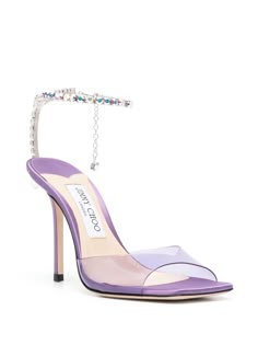 Saeda 115mm sandals from JIMMY CHOO featuring purple, translucent design, crystal-embellished ankle strap, branded leather insole, open toe and high stiletto heel. Size Info IT Color Detail Purple Made In Italy Material Sole: Calf Leather 100% Lining: Calf Leather 100% Outer: Polyurethane 100% Glass 100% Season One Spring-Summer Season Two Spring-Summer Product sandals Brand Jimmy Choo Size And Fit Heel 4,5 in / 11,5 cm; Platform 0,4 in / 1 cm Jimmy Choo Saeda, Purple Sandals, Jimmy Choo Sandals, Latest Fashion Design, Moon Boots, Crossbody Tote Bag, Crystal Chain, Hot Shoes, Sandals Brands