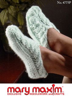 there is a advertisement for mary moxm's knitted slippers on display