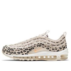 The Nike Womens Air Max 97 SE is a sneaker with a unique design. It features twin inspirations drawn from the natural world and has a reflective finish that mimics a water ripple effect. The textile and suede upper is covered in an all-over graphic made up of numerous leopard spots, offering a touch of glamour. It's mounted on a polyurethane midsole with full-length Max Air cushioning for superior comfort. (SNKR/Low Top/Women's/Non-Slip/Wear-resistant) Water Ripple Effect, Ab Day, Air Max 90 Premium, Orange Camo, Ripple Effect, Air Max 98, Marathon Running Shoes, Air Max Women, Leopard Spots