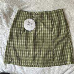 New, Never Worn Green Plaid Mini Skirt. Us 6 But I’d Say It’d Fit More A 4, It Looks Smaller. The Fabric Is A Little See Through But Not Too Bad. High Waist Green Skort For Day Out, Trendy Green Lined Skort, Trendy Green Skort For Day Out, Green Skort For Day Out, Cheap Green Relaxed Mini Skirt, Green Plaid Skirt Set, Plaid Skirt Green, Green Plaid Mini Skirt, Skins Mini