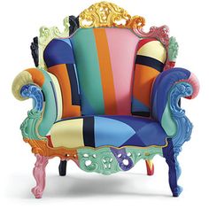 a colorfully decorated chair sitting on top of a white floor