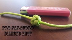 a cell phone is tied to a rope on a table with the text pro paracor diamond knot