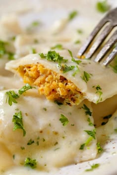 a close up of a plate of food with broccoli and cheese