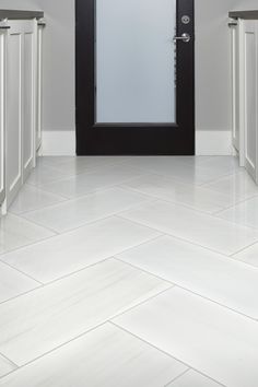 Dolomite White 12x24 tile on floor in kitchen.. Shapes And Patterns, Herringbone Tile, White Kitchen Design, Unique Shapes, Classic Kitchens, Tile Ideas, Kitchen Floor, White Tiles, Herringbone Pattern