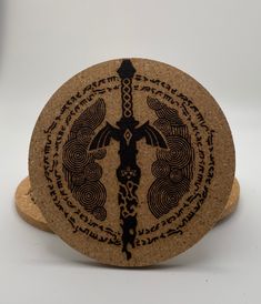 "This set of four cork coasters perfectly holds your favorite beverage while showing off your love for the Zelda universe. The cork material is laser engraved giving a burnished yet precise look while also protecting your furniture from drips and scratches.  The coasters are approximately 3.5\" in diameter and 1/4\" thick. The laser engraving is nice and deep so it won't scratch or wear out." Zelda Tears Of The Kingdom, Tears Of The Kingdom, Cork Material, Cork Coasters, Wakefield, Laser Engraved, Coaster Set, Laser Engraving, Video Game