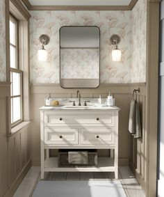 a bathroom with two sinks and a large mirror above the sink, along with a rug on the floor