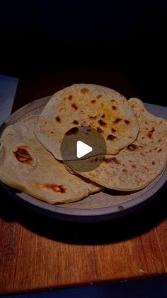 three tortillas sitting on top of a plate