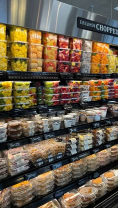 a display in a grocery store filled with lots of food