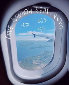 an airplane window with the words one window seat, play written in white on it