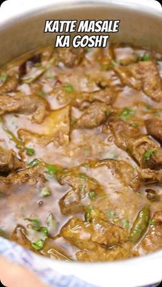 a close up of a bowl of food with meat and veggies in it