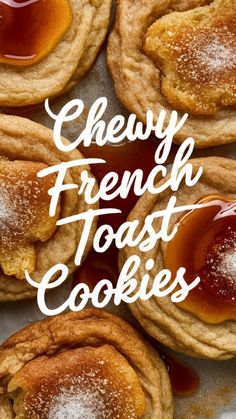 french toast cookies with jam and powdered sugar are on a baking sheet that says cheesy french toast cookies