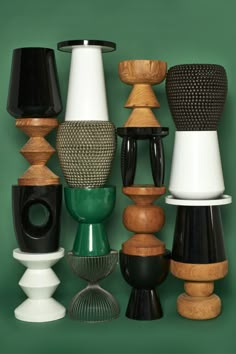 a bunch of different colored vases and lamps on a green background with the caption instagram