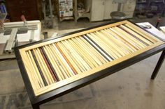 a table made out of wood and some kind of slatted design on it