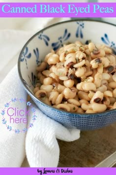 a blue and white bowl filled with black eyed peas