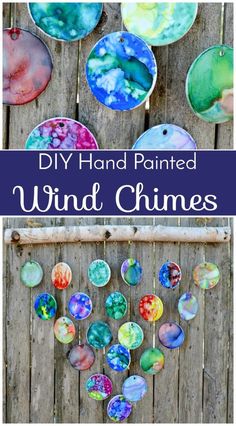 hand painted wind chimes hanging on a wooden fence with text overlay that reads diy hand painted wind chimes