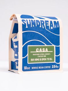 a blue and white box of sundream coffee on a white surface with the words casa printed on it