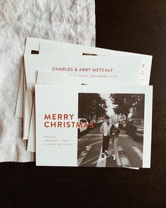 three christmas cards sitting on top of each other