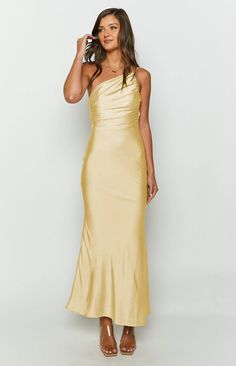 * Yellow Maxi Formal Dress    *     * HOW TO STYLE:   * Be the belle of the ball () at your next event in this stunning yellow satin gown! Featuring a one shoulder strap and gathering throughout the bodice, this maxi dress () is perfect for formals and bridesmaid dresses. Style with dainty gold jewellery () and strappy heels to complete the look!   *     * FEATURES:   * Adjustable asymmetric straps   * Gathered material through bust    * Lined   * Invisible side zip   * Light-weight satin materi Women Robe, Formal Maxi Dress, Yellow Bridesmaid Dresses, Grade 10, Backless Maxi Dress, Wedding Women, Maxi Dress For Women, Yellow Bridesmaids