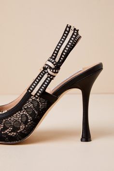 Strut like you mean it in the Steve Madden Bri Black Lace Ribbon Pointed-Toe Slingback Pumps! Sheer floral lace and smooth faux leather come together to shape these flirty pumps with a pointed-toe upper, a low-cut collar, and a single sole silhouette. A grosgrain ribbon creates a cute bow accent at the outstep as it adorns the slingback strap (with a bit of elastic at the side for fit). A sophisticated sculpted stiletto heel lends a sultry finish! 4" wrapped sculpted heel. Cushioned insole. Felt Chic Fitted Synthetic Slingback Pumps, Elegant Lace Heels With Laces, Lace Heels For Evening And Spring, Spring Evening Lace Heels, Chic Fitted Slingback Pumps With Straps, Spring Lace Heels With Pointed Toe, Fitted Lace Heels For Spring, Strappy Pointed Toe Synthetic Heels, Synthetic Heels With Straps And Pointed Toe