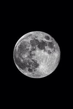 the full moon is seen in the dark sky