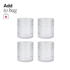 three white glass cups with silver dots on them and the words add to bag above it