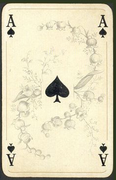 an ace playing card with fruit and flowers on the back side, in black frame