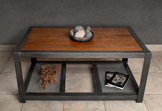 a coffee table with two trays on each side and a book in the middle