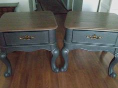 two gray nightstands sitting on top of a hard wood floor next to each other