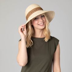 Stay protected from the sun in style with this Waterfront Raffia Braided Bucket Sun Hat. The 100% raffia material ensures a lightweight and breathable experience, while the 3" brim offers ample coverage. The woven jacquard band and natural color give it a classic, yet stylish look. Feel confident wearing this 57cm hat with any summer outfit. Features: Color: NaturalMaterial: 100% RaffiaBrim Size: 3"Size: 57cm Lightweight Wide Brim Hat For The Beach, Lightweight Wide Brim Hat For Beach, Lightweight Wide Brim Hat For Warm Weather, Braided Natural Hat For Spring, Braided Natural Spring Hat, Lightweight Uv Protection Sun Hat For Spring, Braided Straw Hat For Summer, Lightweight Wide Brim Sun Hat For Vacation, Lightweight Wide Brim Sun Hat For Beach