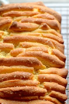 a loaf of bread sitting on top of a cooling rack