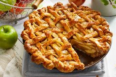 an apple pie with one slice cut out