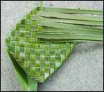 a green piece of cloth sitting on top of a table