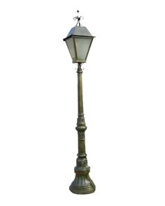 an old fashioned street light on a white background