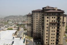 an aerial view of a large apartment building