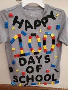 a t - shirt that says happy 100 days of school on it with legos all over it