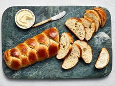 sliced bread and butter on a cutting board